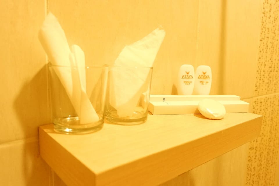 Slippers, towels, soap, shampoo