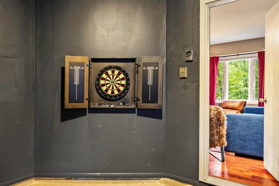 Challenge your aim with a round of darts before heading to the arcade, foosball, or pool table — all in a light-filled game room with expansive windows and unbeatable vibes.