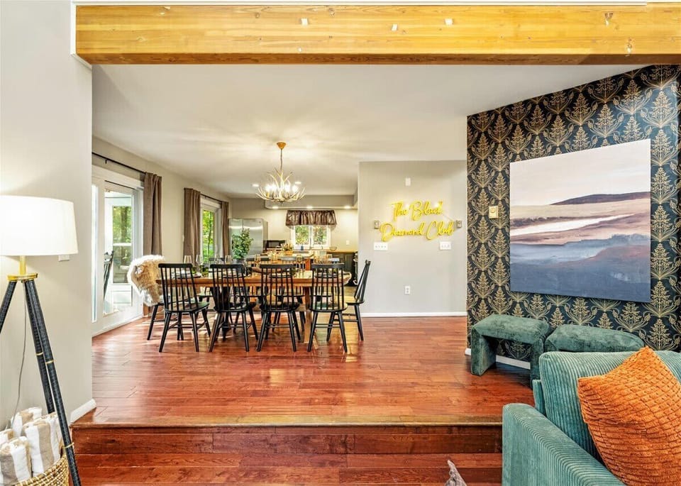 Our dining area sits right beside the cozy living room — perfect for flowing conversations, family meals, and easy entertaining.

