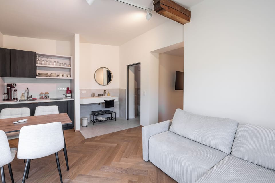 Deluxe Studio Suite, Balcony, Hill View | Living area | Toys
