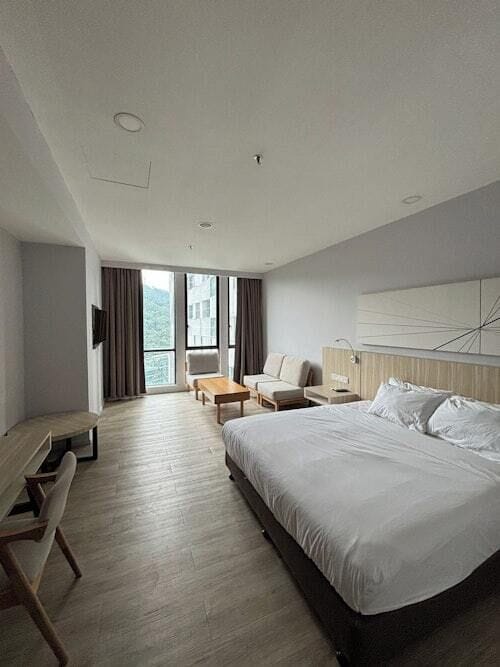 Deluxe Double Room | In-room safe, desk, blackout drapes, iron/ironing board