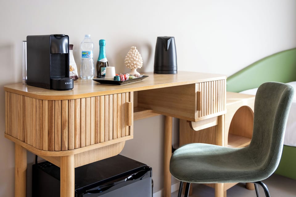 Deluxe Triple Room, City View | In-room safe, laptop workspace, blackout drapes, soundproofing