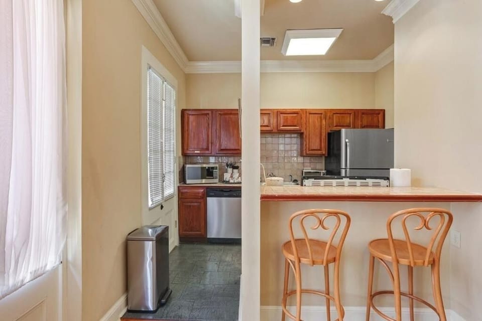 Cook with ease in this bright kitchen with breakfast bar.