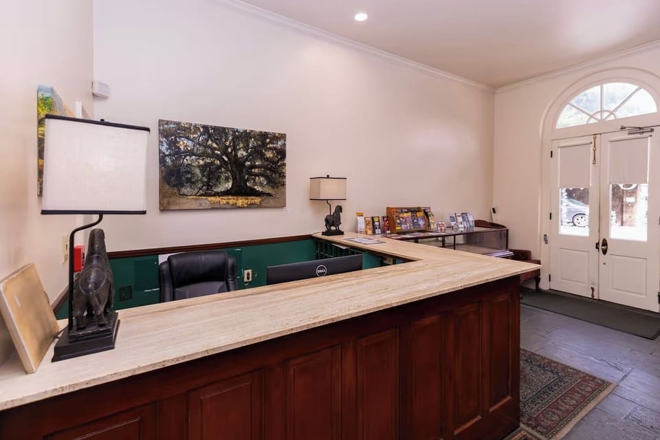 Check in smoothly at the welcoming front desk with warm lighting.