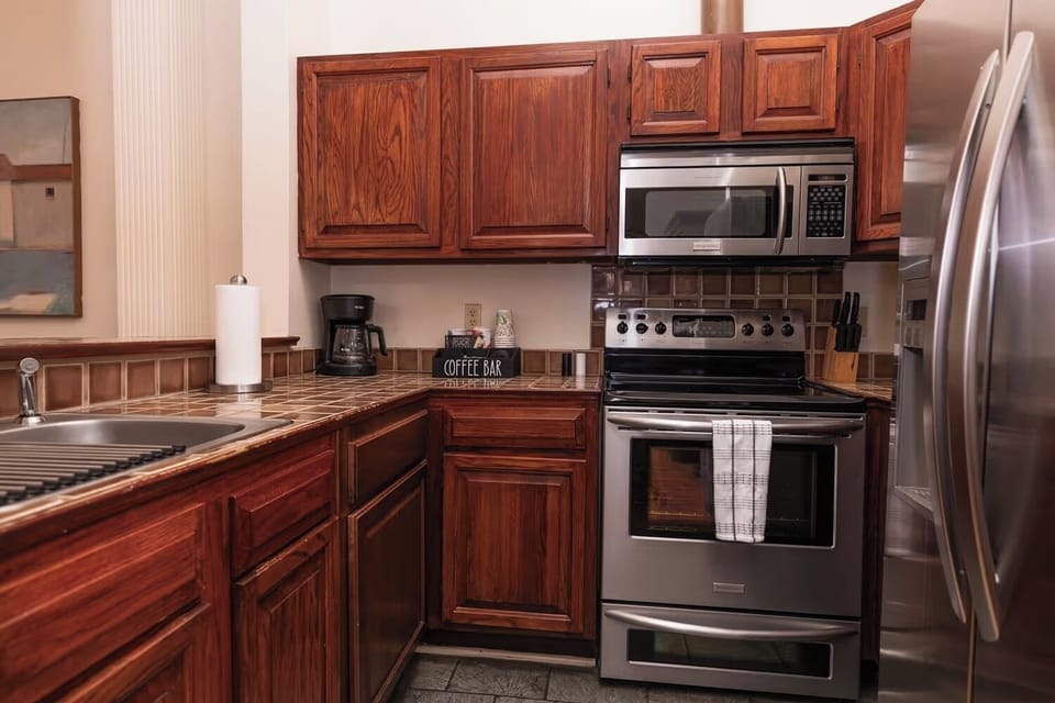 Brew fresh coffee and cook with modern stainless appliances.