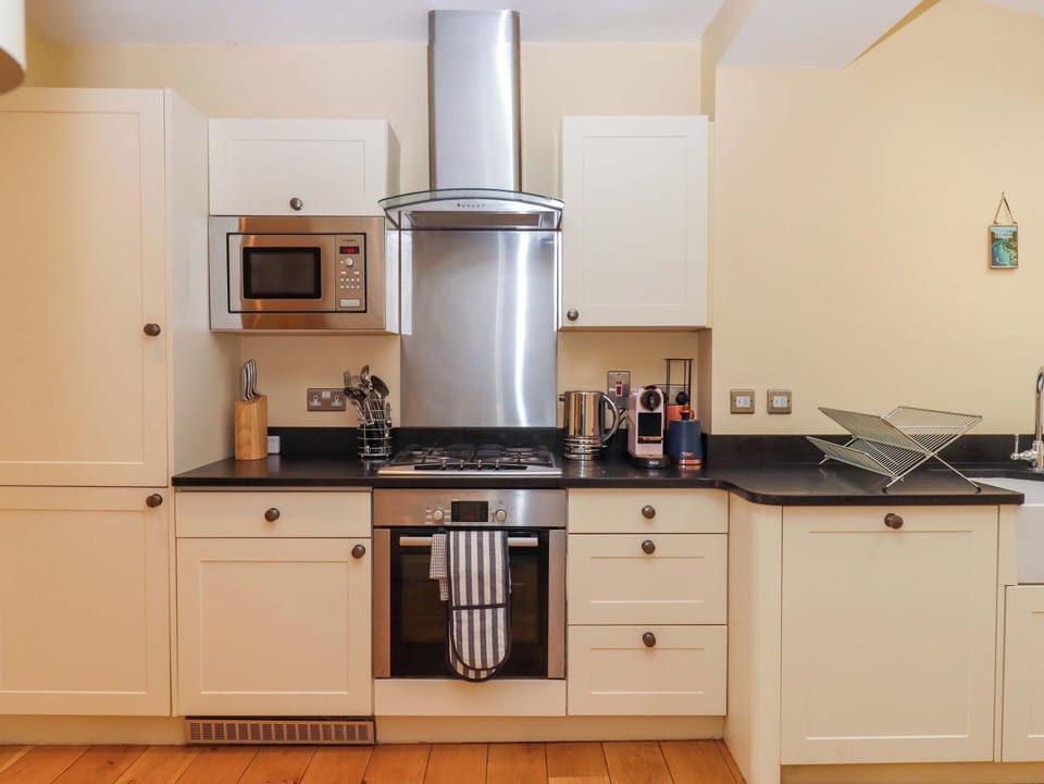 Fridge, dishwasher, toaster, cookware/dishes/utensils