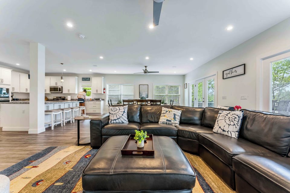 Living Room 1: Sink into the oversized sectional and enjoy lake views right from the living room