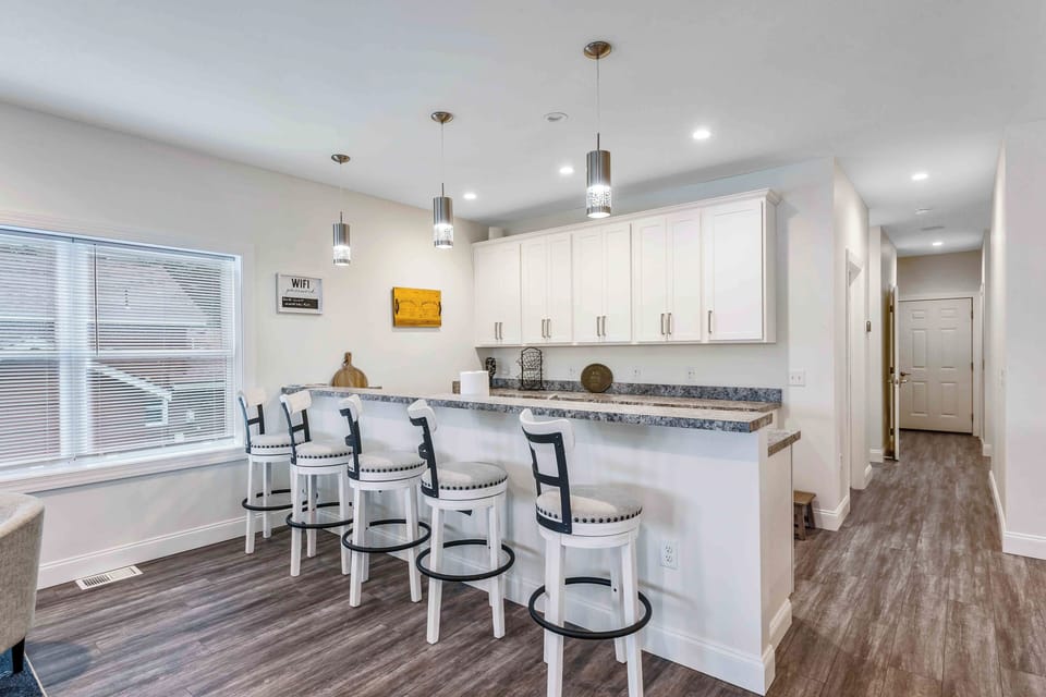 Spacious kitchen island with bar seating.