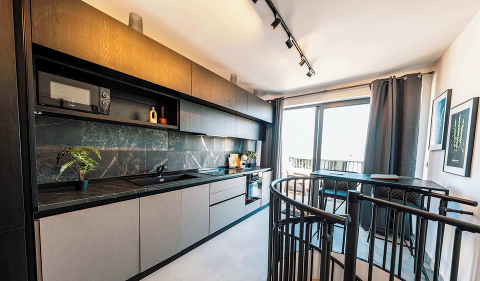 Duplex Apartment with a Kitchen and Terrace on Top Floor