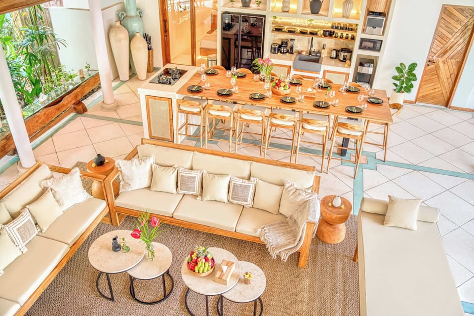 Move easily between kitchen, dining table and lounge in this airy shared space