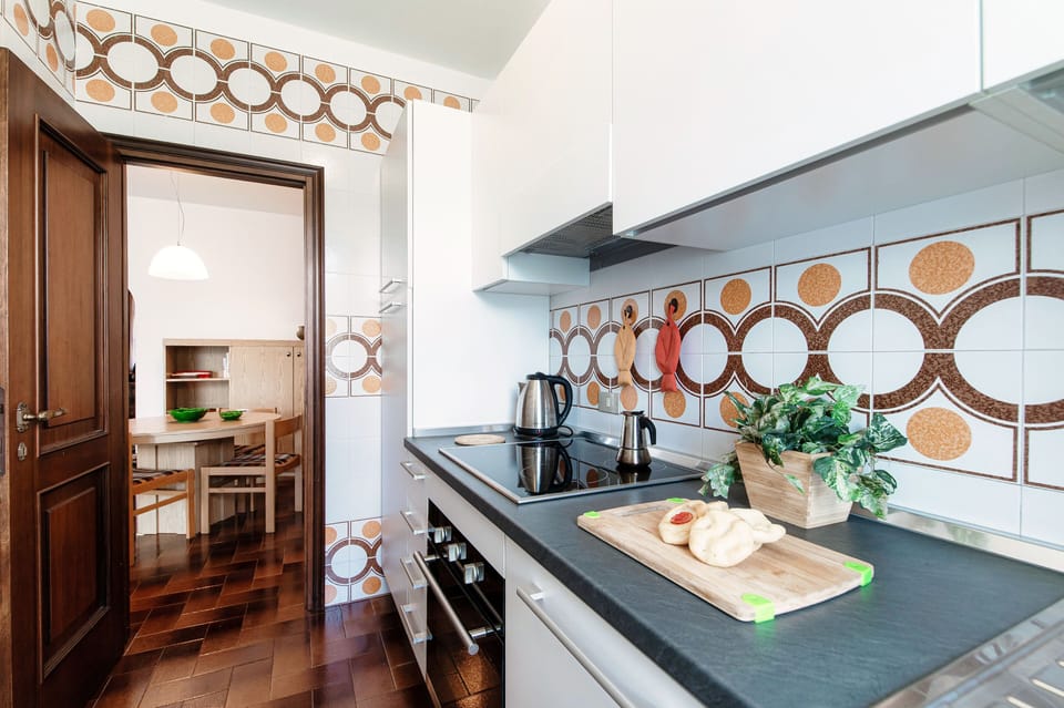 Apartment, Lake View | Private kitchen | Full-size fridge, oven, stovetop, dishwasher