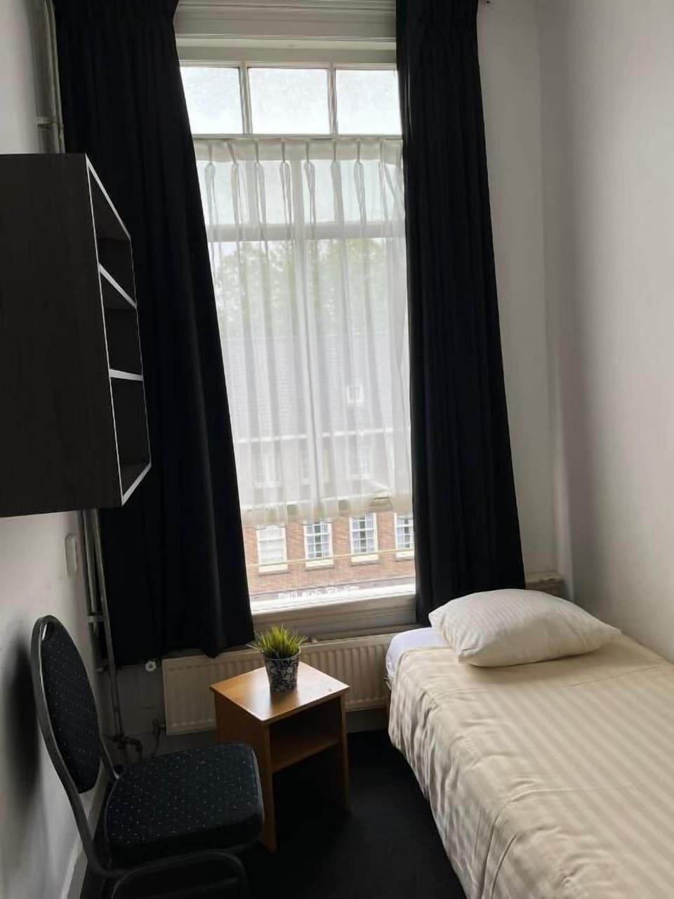 Economy Single Room, 1 Bedroom | Iron/ironing board, free WiFi