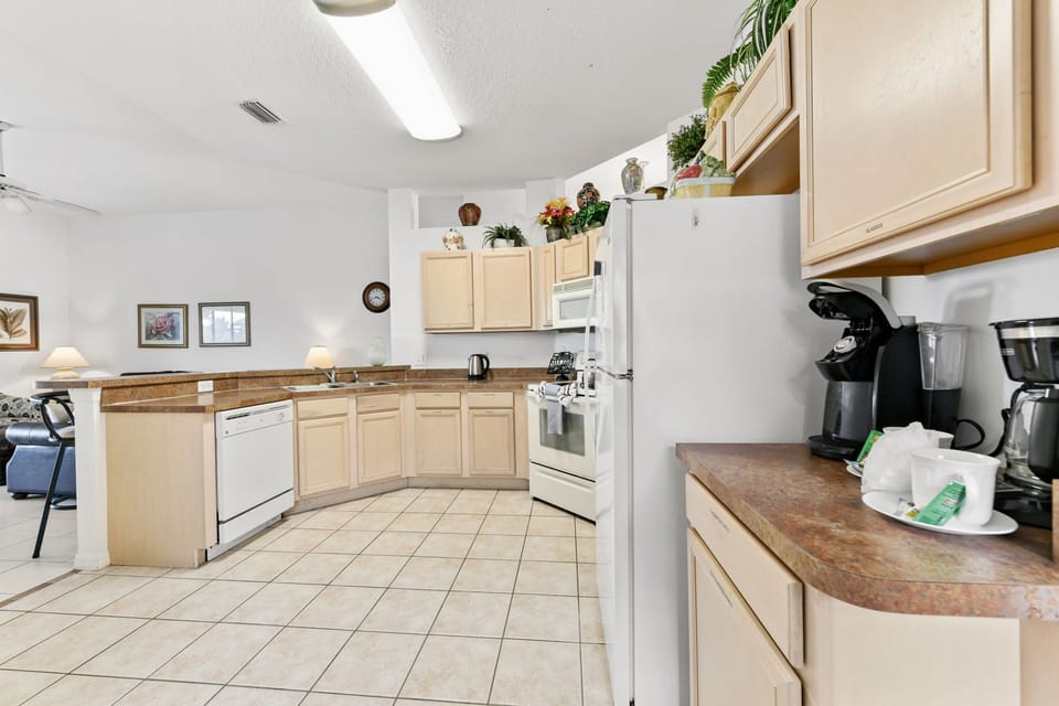 KITCHEN: Fully Equipped with Refrigerator, Microwave, Stove and Dishwasher
