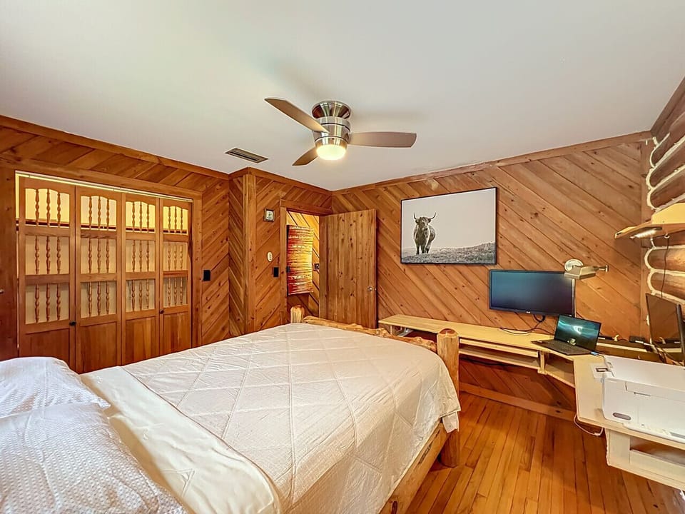 Bedroom 1 | Queen Bed | Rustic Frame & Comfortable Stay | Work-friendly