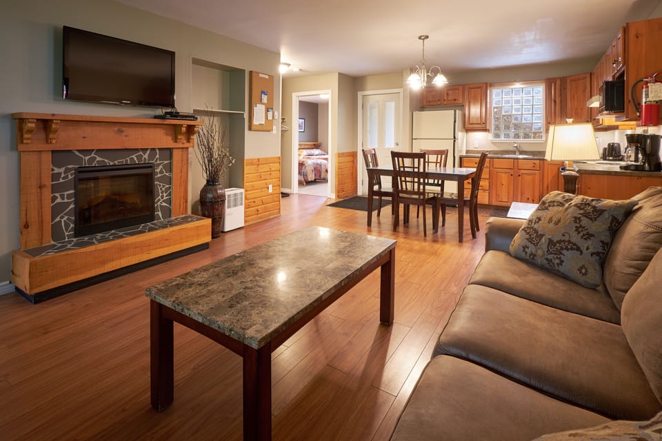 Condo, 2 Bedrooms | Living area | 42-inch flat-screen TV with cable channels, TV, fireplace