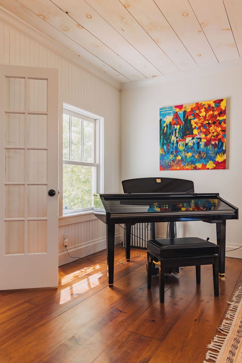 Find your rhythm in the heart of the farmhouse and enjoy peaceful moments at the piano with views of the garden just outside.