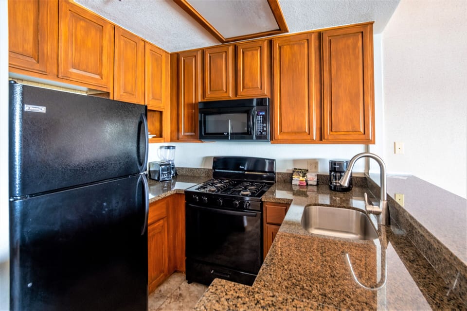 Apartment, 1 Bedroom, Balcony | Private kitchen | Full-size fridge, microwave, stovetop, dishwasher