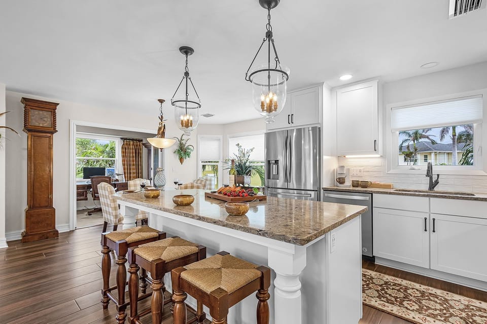 Large island with barstools. perfect for morning breakfast and coffee.
