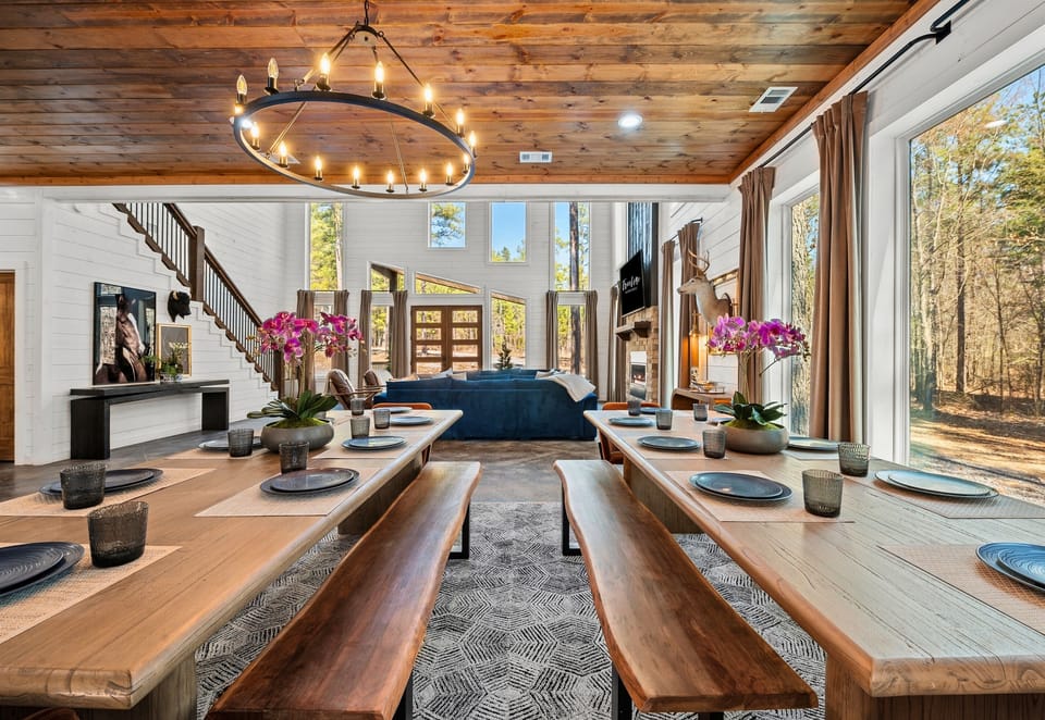 The spacious dining area is set for memorable meals, with a stylish setup that makes every dinner feel special.