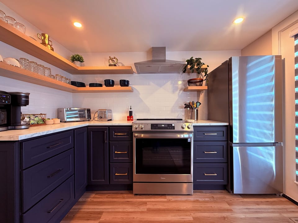Fully stocked kitchen with modern appliances