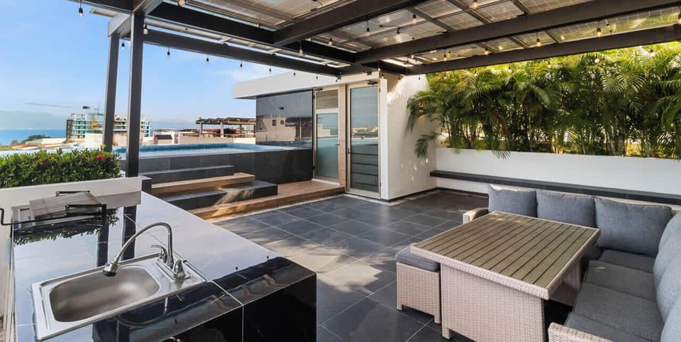 Rooftop Terrace with Grill and Seating