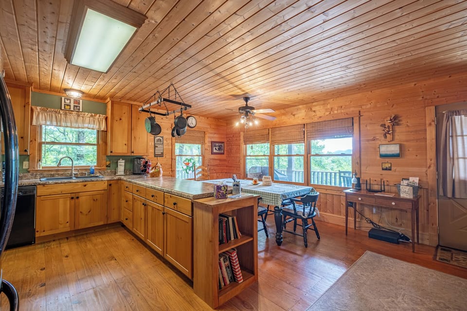 With plenty of space to prep and serve meals, this fully stocked kitchen makes it easy to cook for a crowd during your Bryson City vacation.