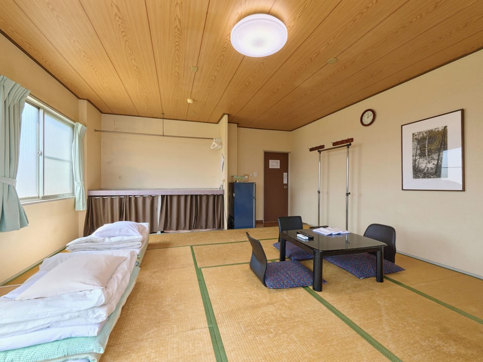 Japanese-style Triple Room, Smoking, Shared Bathroom (for 3 pax) | Down comforters, free WiFi, bed sheets