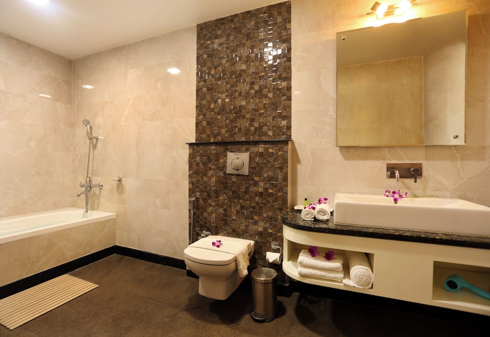 Suite | Bathroom | Free toiletries, slippers, towels, soap