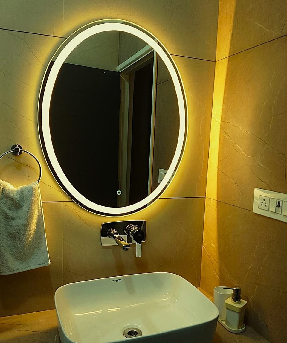 Shower, designer toiletries, slippers, bidet