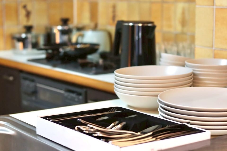 Apartment | Private kitchen | Full-size fridge, microwave, stovetop, cookware/dishes/utensils