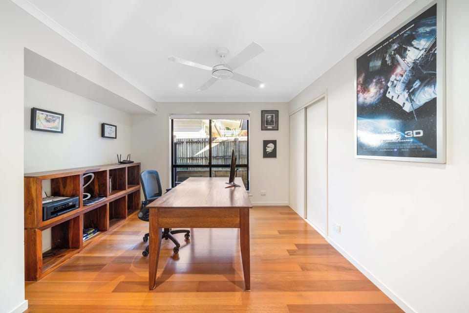 Stay productive in the dedicated home office, complete with a spacious desk and a quiet setting that's ideal for remote work or study.
