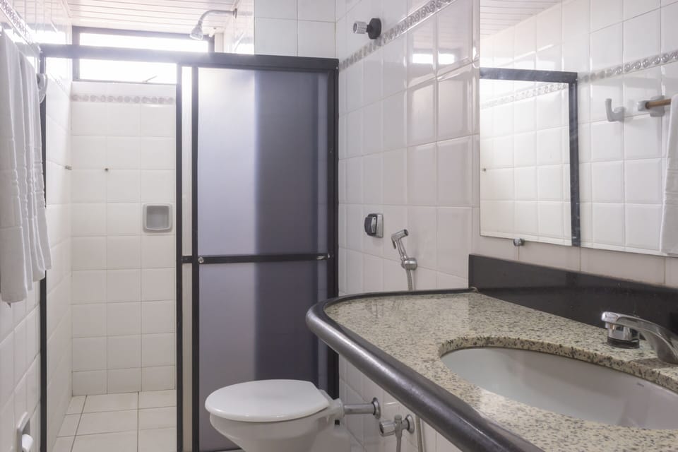 Shower, towels, toilet paper