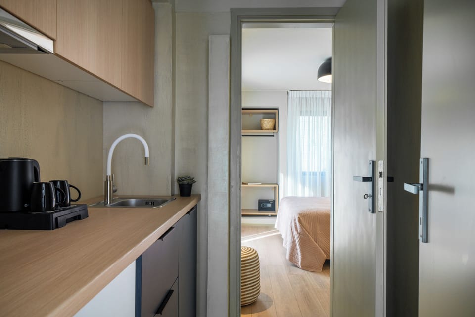 Exclusive Apartment, Balcony | Private kitchen | Mini-fridge, electric kettle, highchair