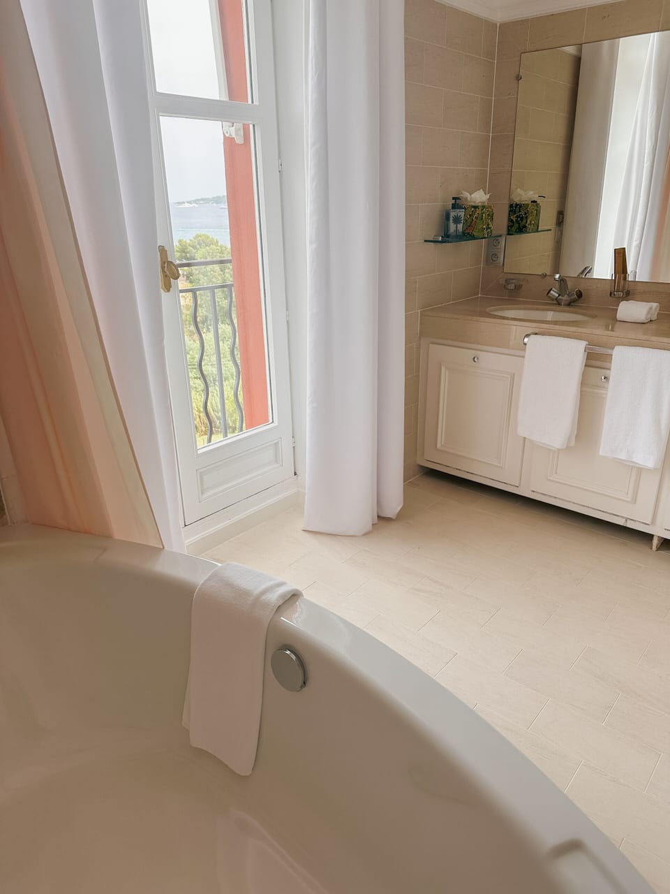Designer toiletries, hair dryer, bathrobes, slippers