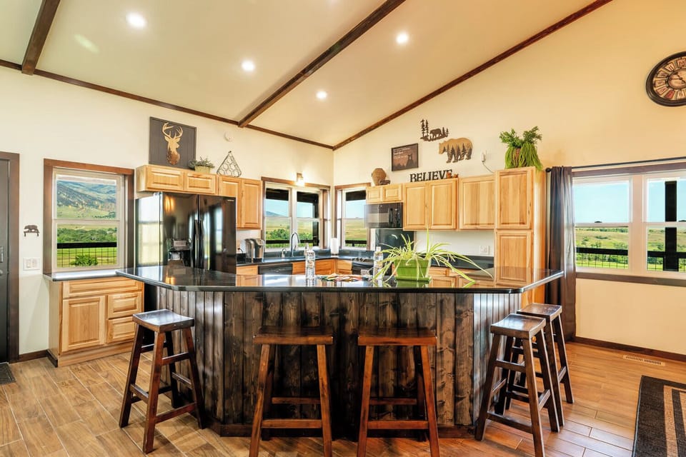 An open kitchen with generous light, making meals feel easy and unhurried.