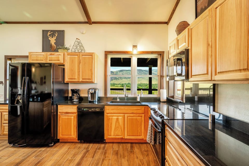 Bright windows bring the outdoors in while you cook or clean up.