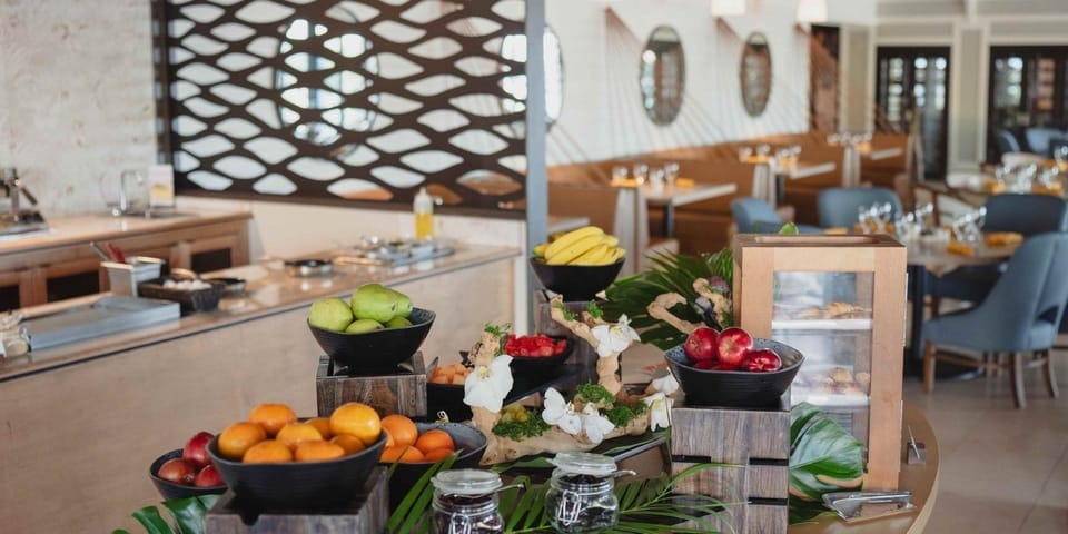 Start your morning with fresh fruit, pastries, and island flavors
