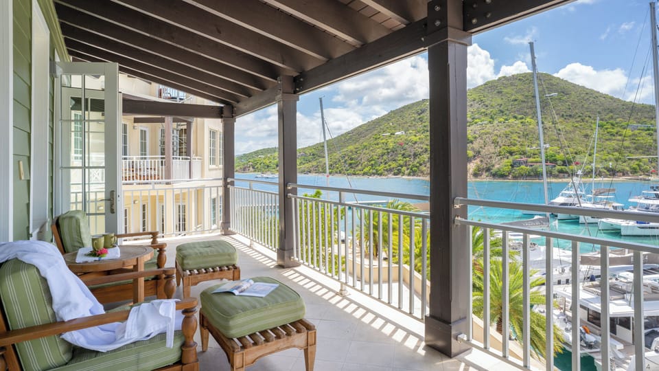 Sip morning coffee on the balcony overlooking the marina.