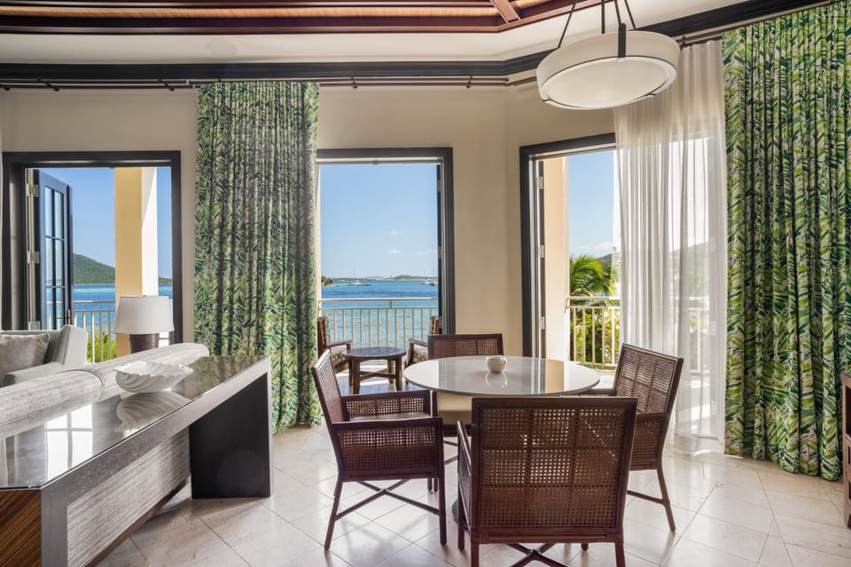 Savor sunset meals with ocean vistas through open doors.
