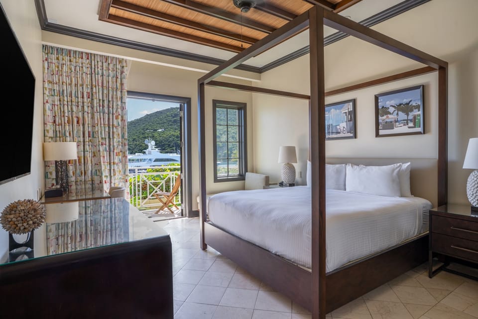 Wake up to island breezes and balcony views from bed.