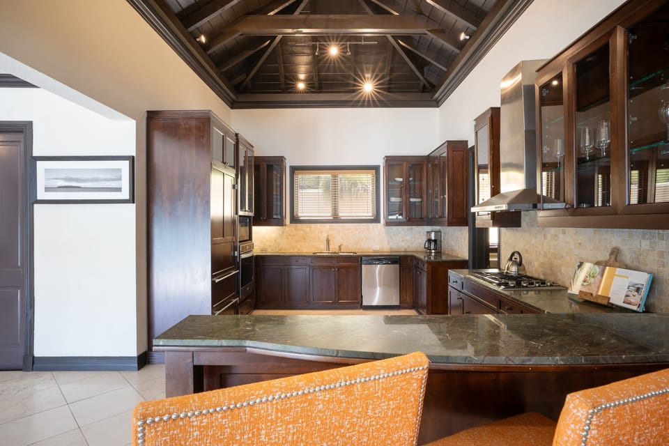 Cook island-style meals in a sleek, fully equipped kitchen.
