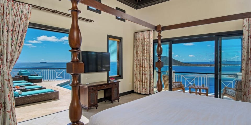 Wake up to dazzling ocean views from a dreamy bed.