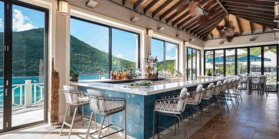 Sip handcrafted cocktails at the breezy bar overlooking the bay