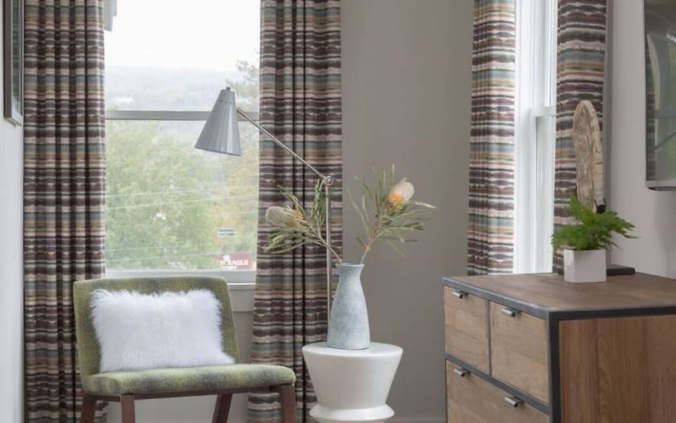 Settle into a cozy corner with natural light and calm views.
