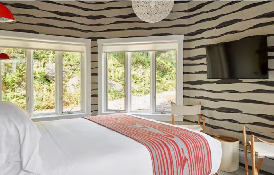Wake up to sunlit windows and relax with evening TV.