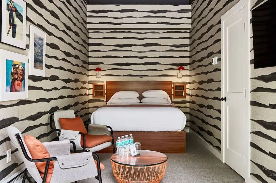 Settle into a stylish retreat with artful patterns and lounge chairs.