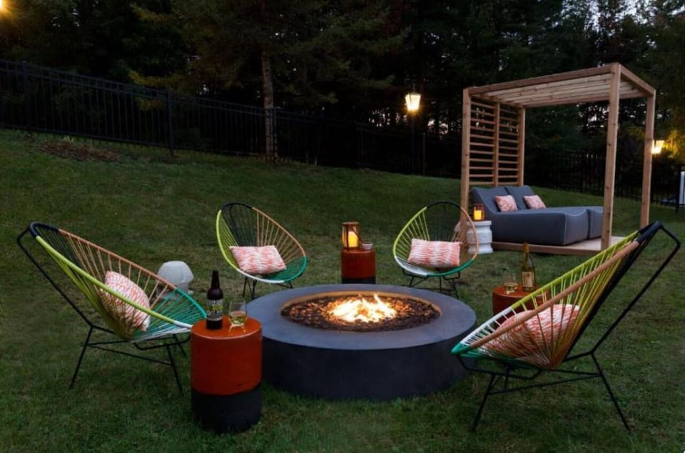 Gather under the stars around a cozy, crackling firepit.