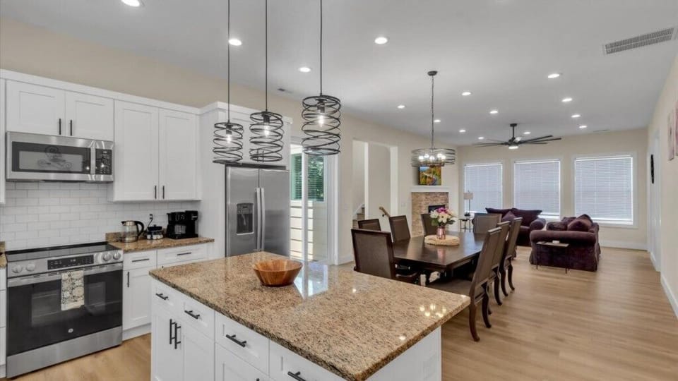 11 View from Kitchen into Dining and Living Space