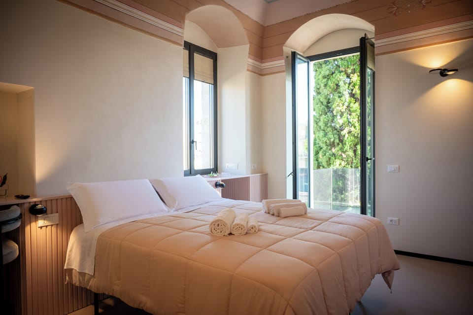 Deluxe Double or Twin Room, 1 Bedroom, Balcony, Courtyard View | Minibar, in-room safe, individually decorated, individually furnished