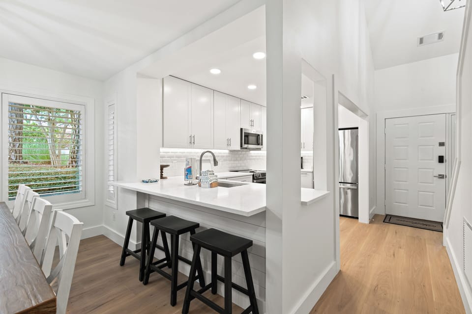 8 Dining Seats, 3 Barstools for a total seating of 11